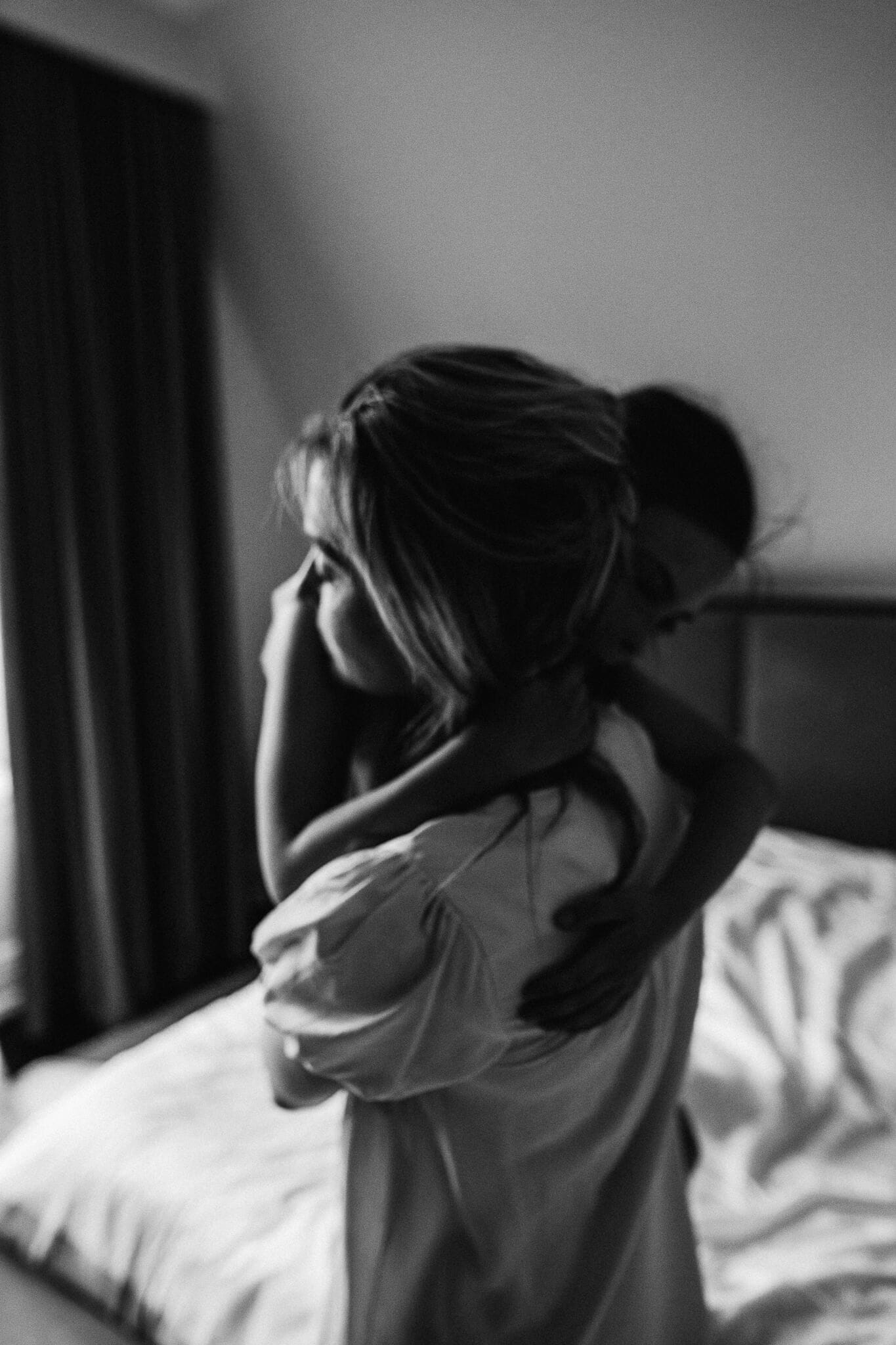 Black and white etheral image of woman holding little girl in her arms in westmount q